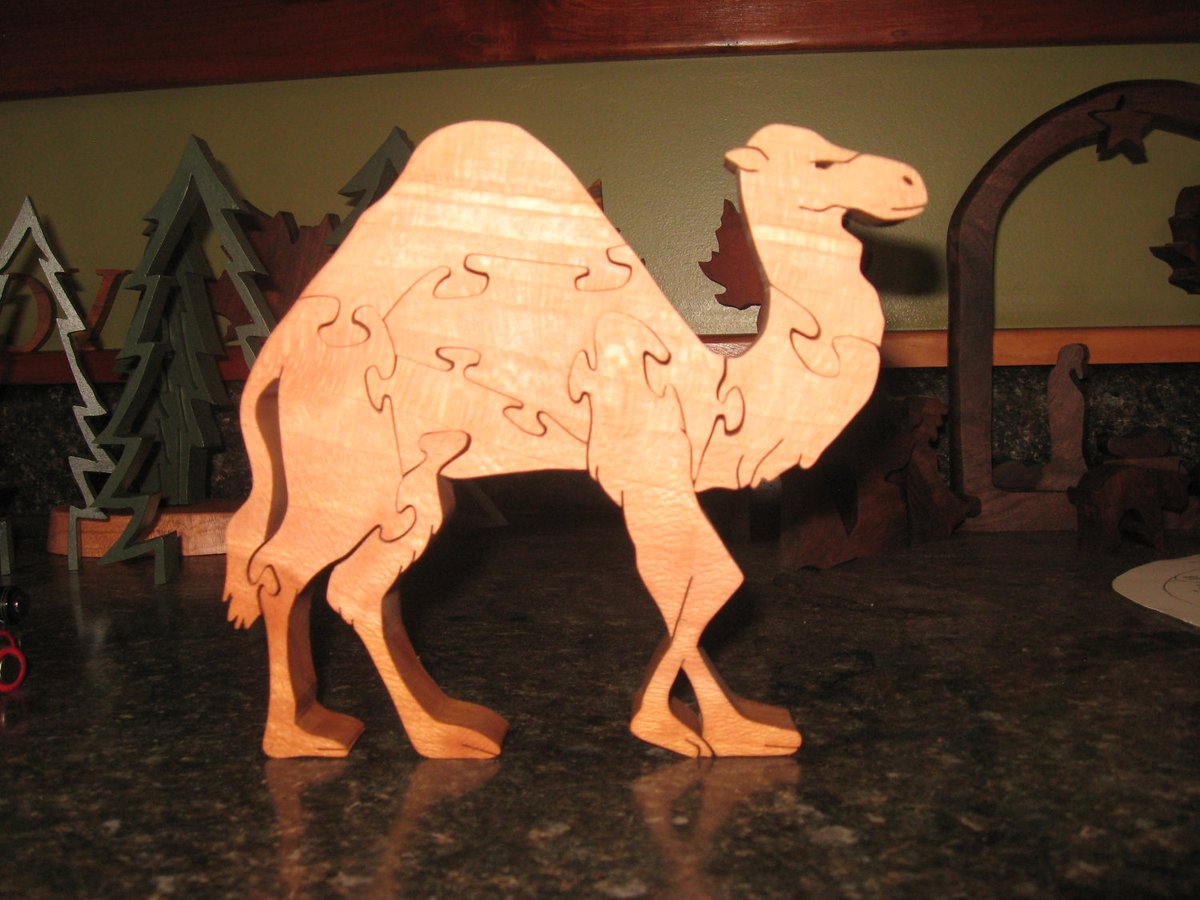 teaberry2011's tweet photo. unique wooden camel puzzle https://t.co/lz1TZTPc5q #Etsy #Teaberrywoodproducts #NativityCamel https://t.co/nfdcyhEQjm