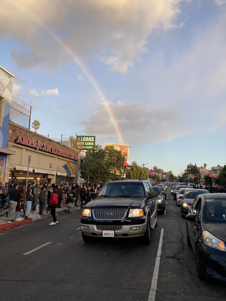 guerinemily's tweet photo. The magic moment when the 🌈 appeared above the spontaneous dance party on Sunset Blvd in Echo Park https://t.co/89m66gseRW
