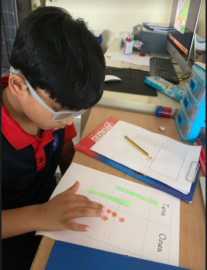 WPS_Year2's tweet image. Rohan has been using his tens and ones frame at home to calculate our addition sentences. #WPSMaths #WPSRemoteLearning