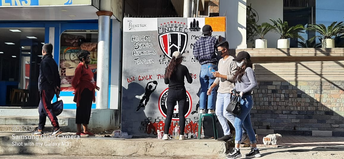 PohchenEvan's tweet photo. Beautiful Graffiti by @HighlanderB8 in Shillong to garner support for @NEUtdFC in the upcoming @IndSuperLeague 2020-21.
8 States 1 United☝
#WWTTT
#wewalkthroughthistogether
https://t.co/2tvtZNgBrx https://t.co/stTMEAOUKk