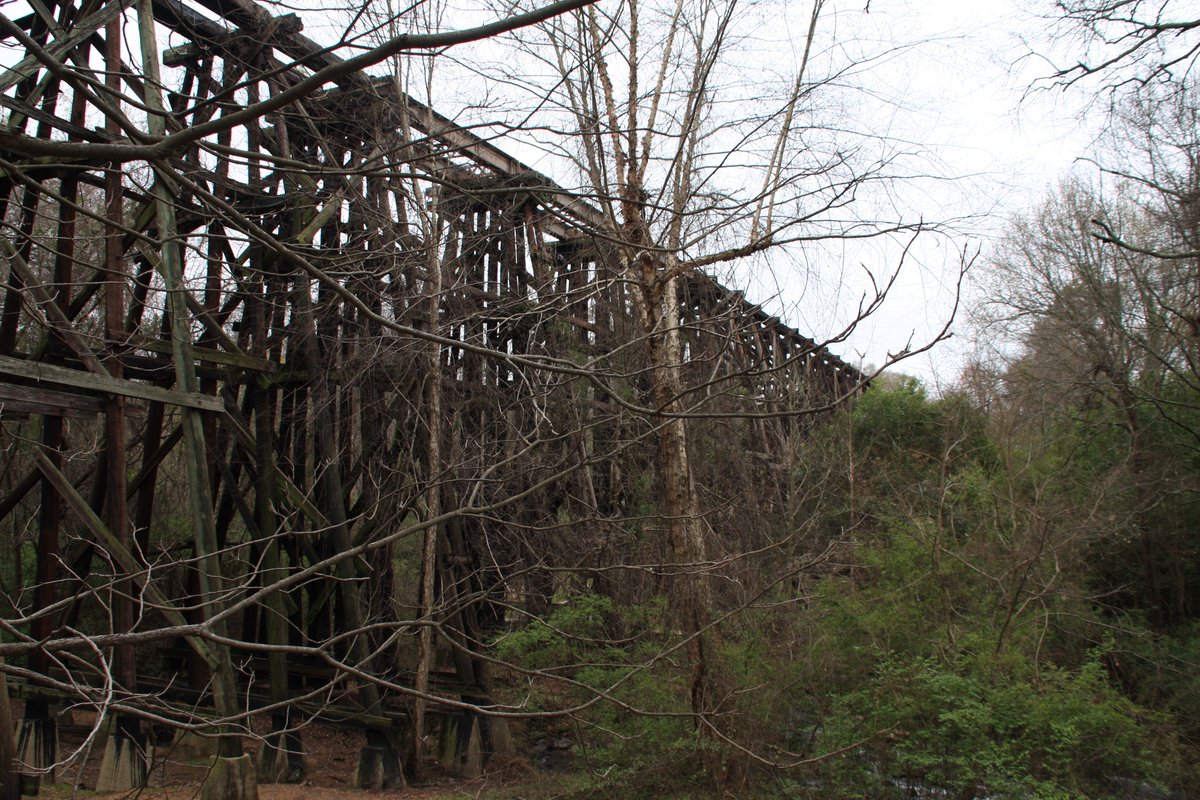 The Georgia Railroad opened the trestle bridge in 1883. This railway ran from Athens to Augusta and began carrying passengers from Athens in 1841—but its station was on the edge of town. The trestle allowed it to run to a station located more centrally.