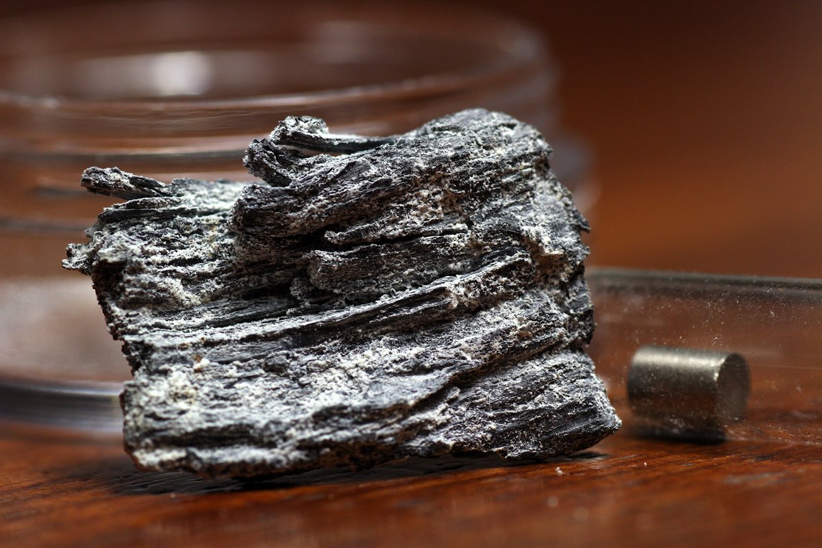 Samarium  #elementphotos. Sm is sensitive to oxidation, as can be seen for these samples. Metal pellet is a samarium-cobalt (SmCo5) magnet.