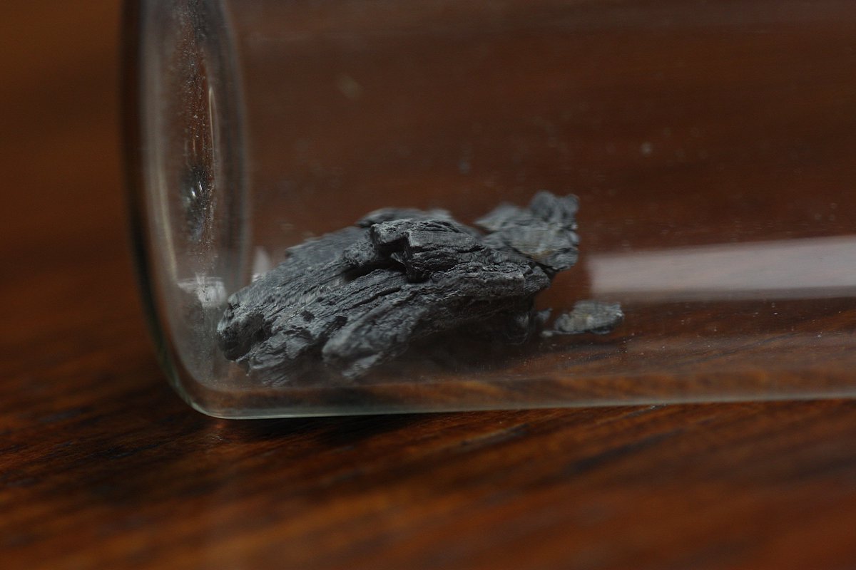 Samarium  #elementphotos. Sm is sensitive to oxidation, as can be seen for these samples. Metal pellet is a samarium-cobalt (SmCo5) magnet.