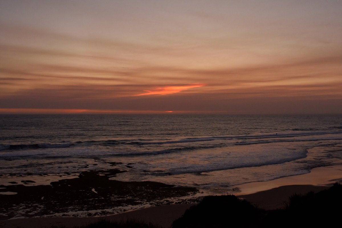 scape366's tweet photo. #scape366.com 313 - One last bright #orange #streak of #cloud remaining after #sunset, casting a lovely hue over the #bassstrait and the #pointlonsdalebackbeach. A peaceful evening in #pointlonsdale at #dusk, just along the track from the lighthouse #seascape https://t.co/Z5H1wg5iaa