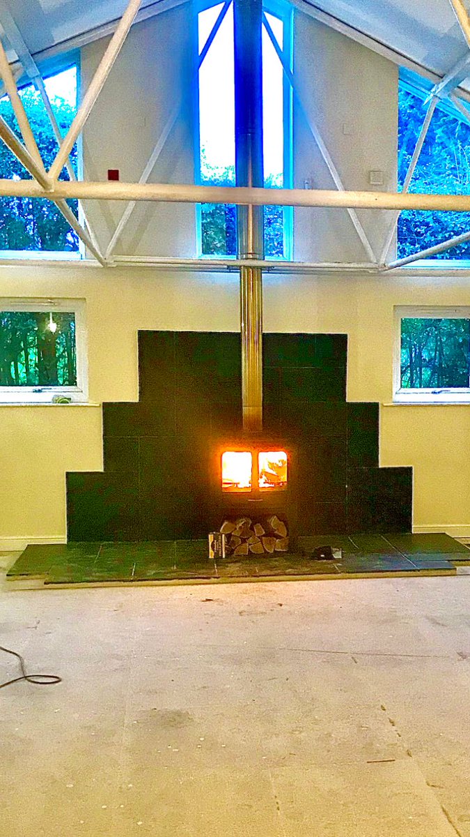 CorrallsCoal's tweet photo. A bit of a different installation this one, a @CharnwoodStoves island 3 with log store stand and @Metaloterm chimney system at this swimming pool which is being converted into a living area #stove #IsleofWight #IOW #woodburner https://t.co/q4ny7mmiPF