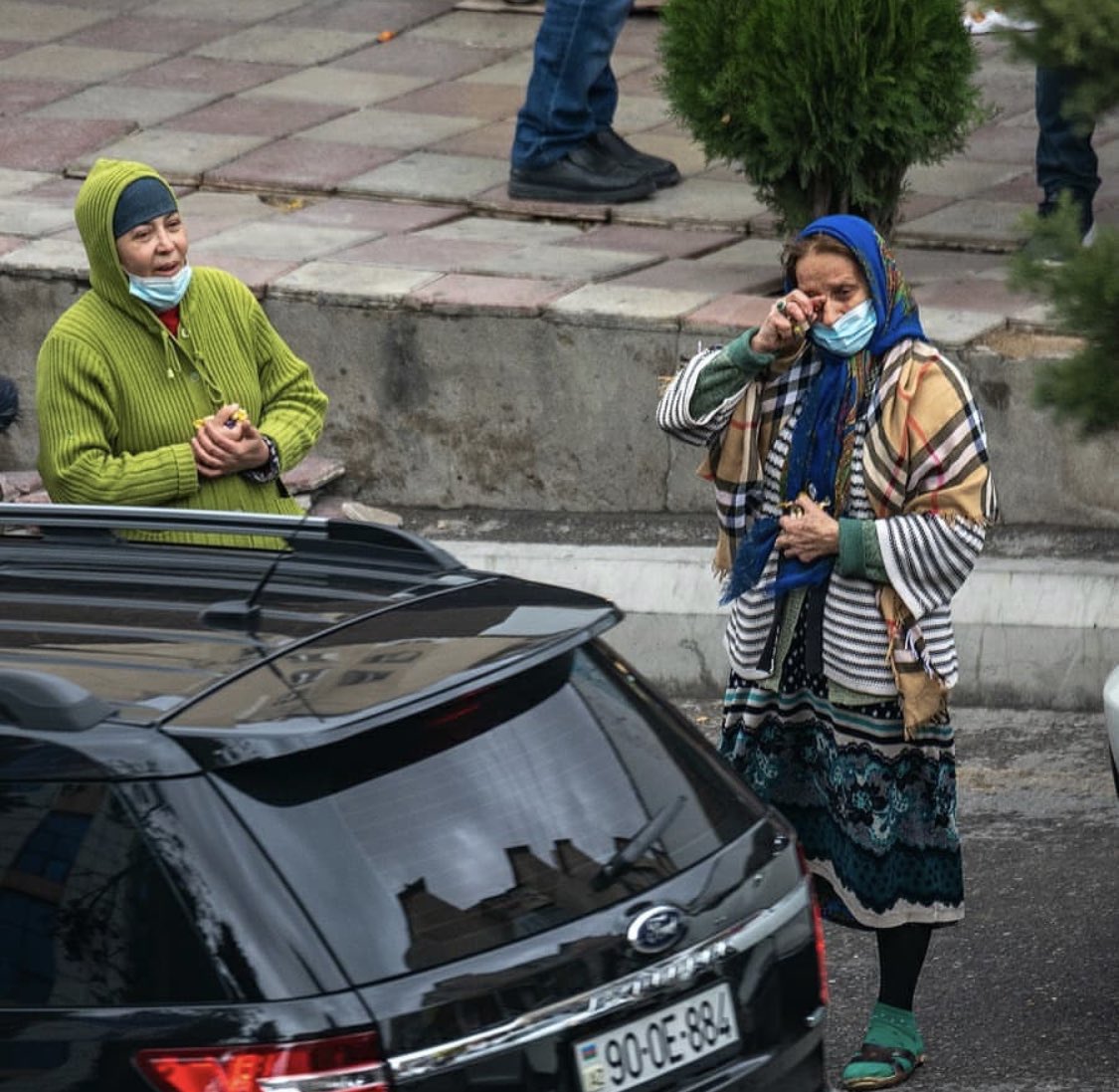 azeridictionary's tweet photo. Do you know what is #Azerbaijan? Azerbaijan is this woman who can’t keep her tears while sharing candies to the people celebrating on the streets! 

Azerbaijan is these people... who are ready to share the last of what they have! Azerbaijan is #Shusha! #Şuşa is Azerbaijan! 🇦🇿❤️ https://t.co/VLM1L1vbxf