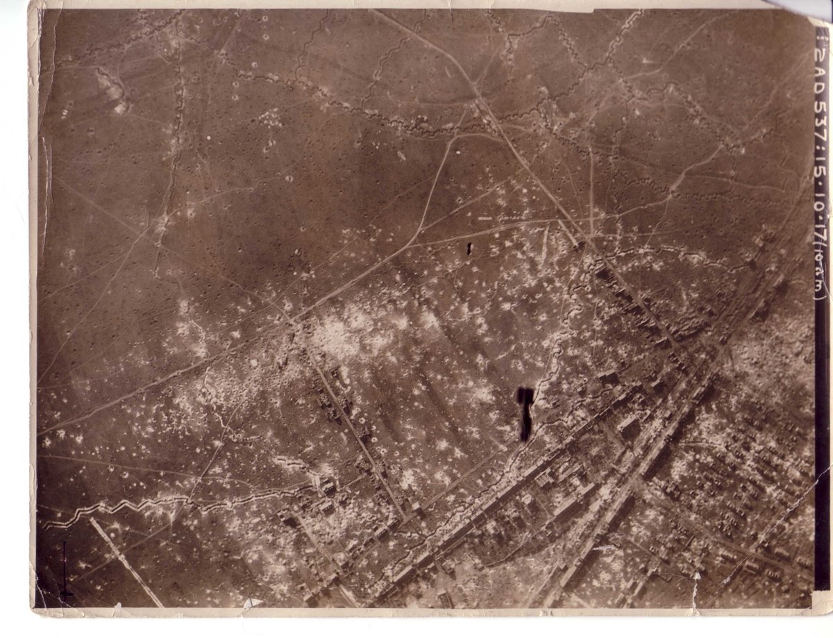 This incredible photo shows the combined early air corps activities with aerial photography showing the dropping bombs