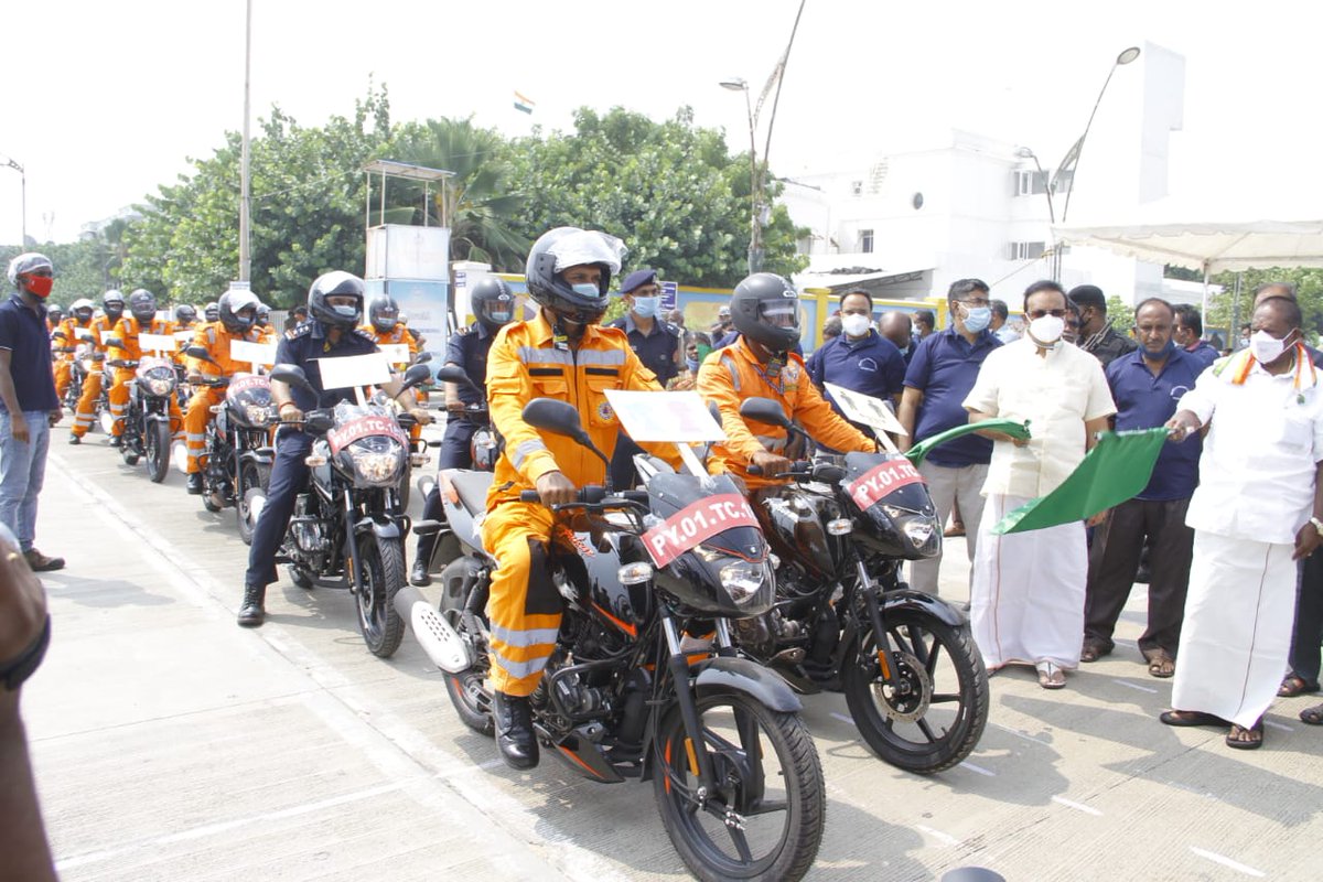 ExcmPuducherry's tweet photo. HCM Shri.@VNarayanasami along with Hon'ble Revenue Minister Shri M.O.H.F.Shajahan flagged off the Bike Rally on #COVID19 Awareness in Puducherry by National Disaster Response Force (NDRF) at Beach Road organized by District Disaster Management Authority#puducherry #covidawareness https://t.co/MBXTj0ZLg2