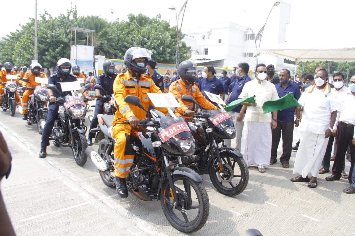 ExcmPuducherry's tweet photo. HCM Shri.@VNarayanasami along with Hon'ble Revenue Minister Shri M.O.H.F.Shajahan flagged off the Bike Rally on #COVID19 Awareness in Puducherry by National Disaster Response Force (NDRF) at Beach Road organized by District Disaster Management Authority#puducherry #covidawareness https://t.co/MBXTj0ZLg2