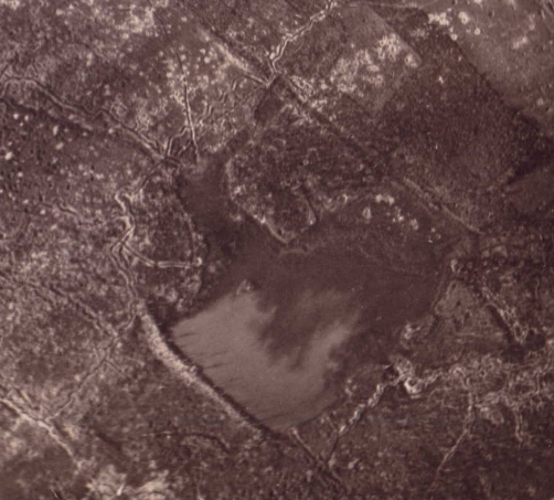 It didn’t actually take that long, and I was a little shocked to discover the picture is of Hooge. The body of water is the Hooge crater; the other reason Hooge is infamous.