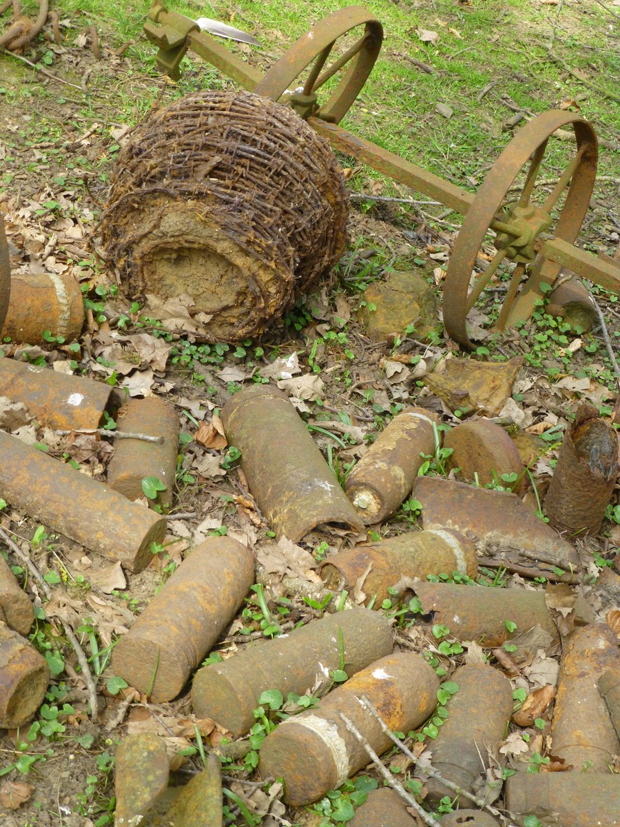But look a little closer and things become far more eerie. The space is littered with not just barbed wire but ordnance.