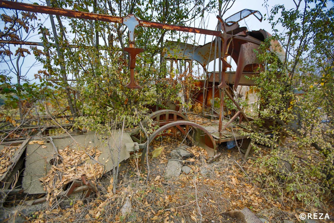 REZAphotography's tweet photo. The newly liberated town of Füzuli is a ghost town. Nature took over everything. This bus reminded me of stories of displaced in the 90s. They took buses to leave their land and were stop, robbed, assaulted and humiliated by Armenian soldiers. #Azerbaijan #Karabakh #Fuzuli https://t.co/29RqzLwlF1
