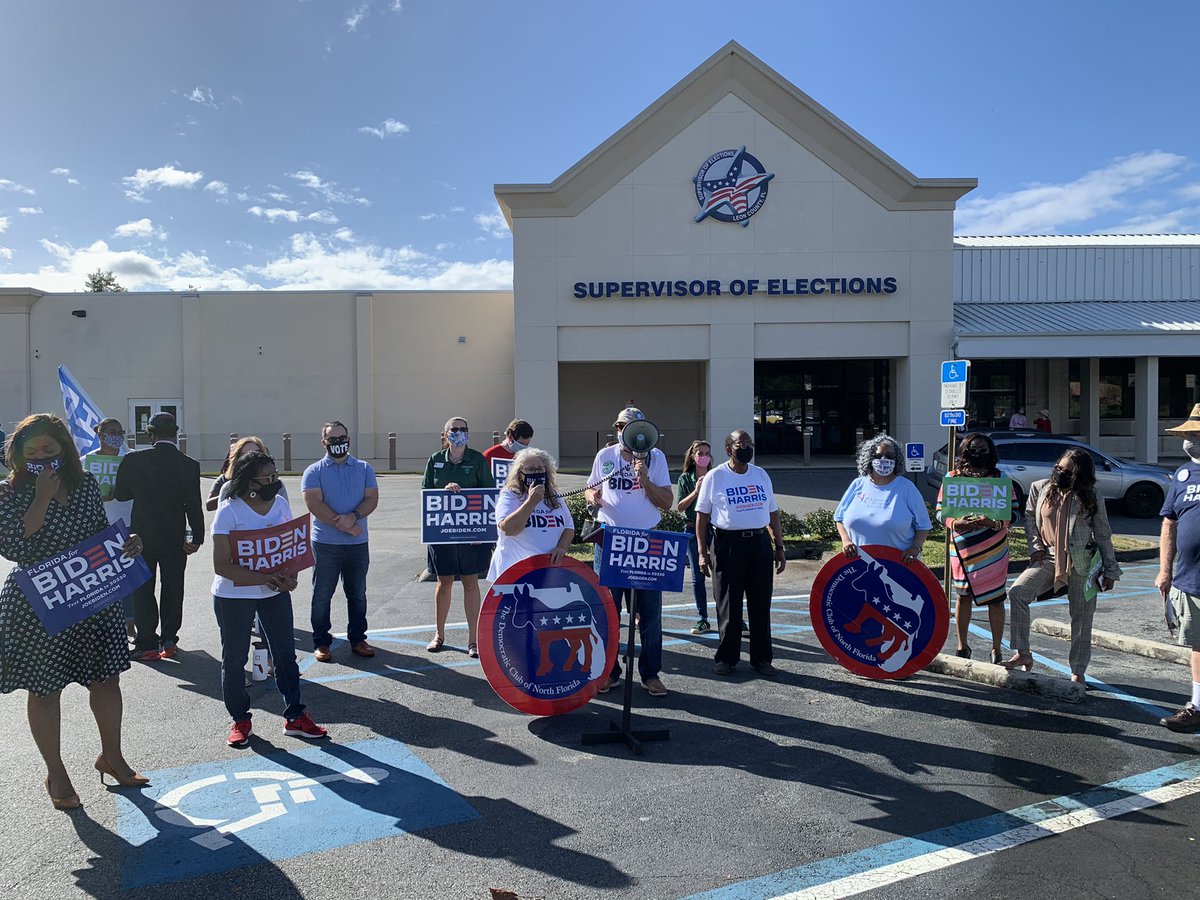 photoriphy's tweet photo. A group of Democrats have gathered at the Leon County Supervisor of Elections Office today for a press conference and will soon be departing for a caravan through town celebrating the Biden-Harris victory https://t.co/nWUg4dWHCu