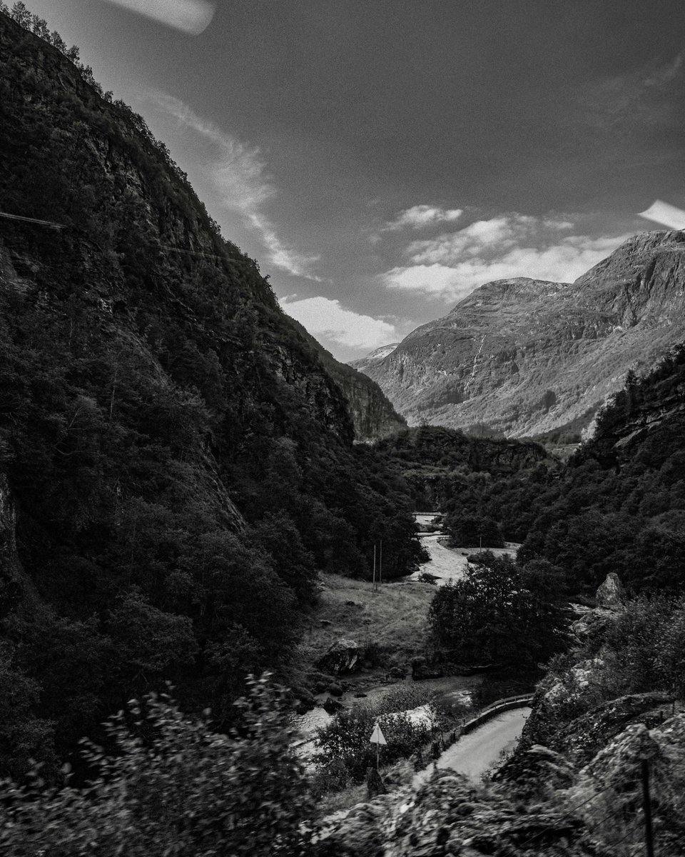 Awesome #fjord views in #norway. This was taken from a moving train. Fast shutter speed 😀 #bnwlandscapes #blackandwhitephotography