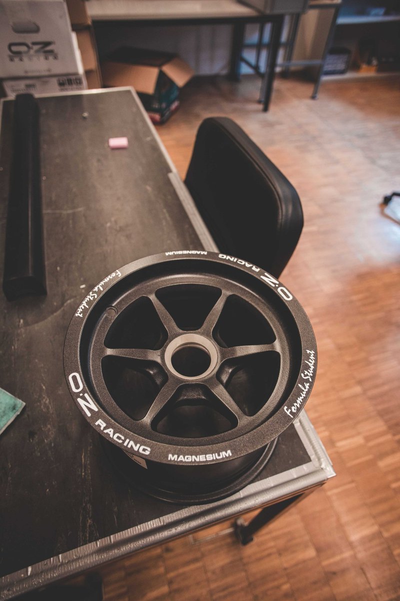 epflracingteam's tweet photo. New wheels for the new car. Going from 13’’ to 10’’ considerably reduces our unsprung weight and will also give us a faster acceleration; a 6.96kg loss overall. Even lighter home made wheels are in development right now ! Stay tuned. https://t.co/MLLbRwfqKd