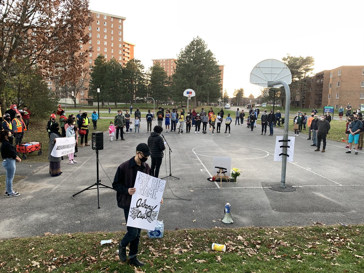More than 100 people gathered for a vigil in memory of Anthony Aust,23. He died Oct 7, after falling from 12th floor window, following a no knock -dynamic entry by the Ottawa Police tactical team.
