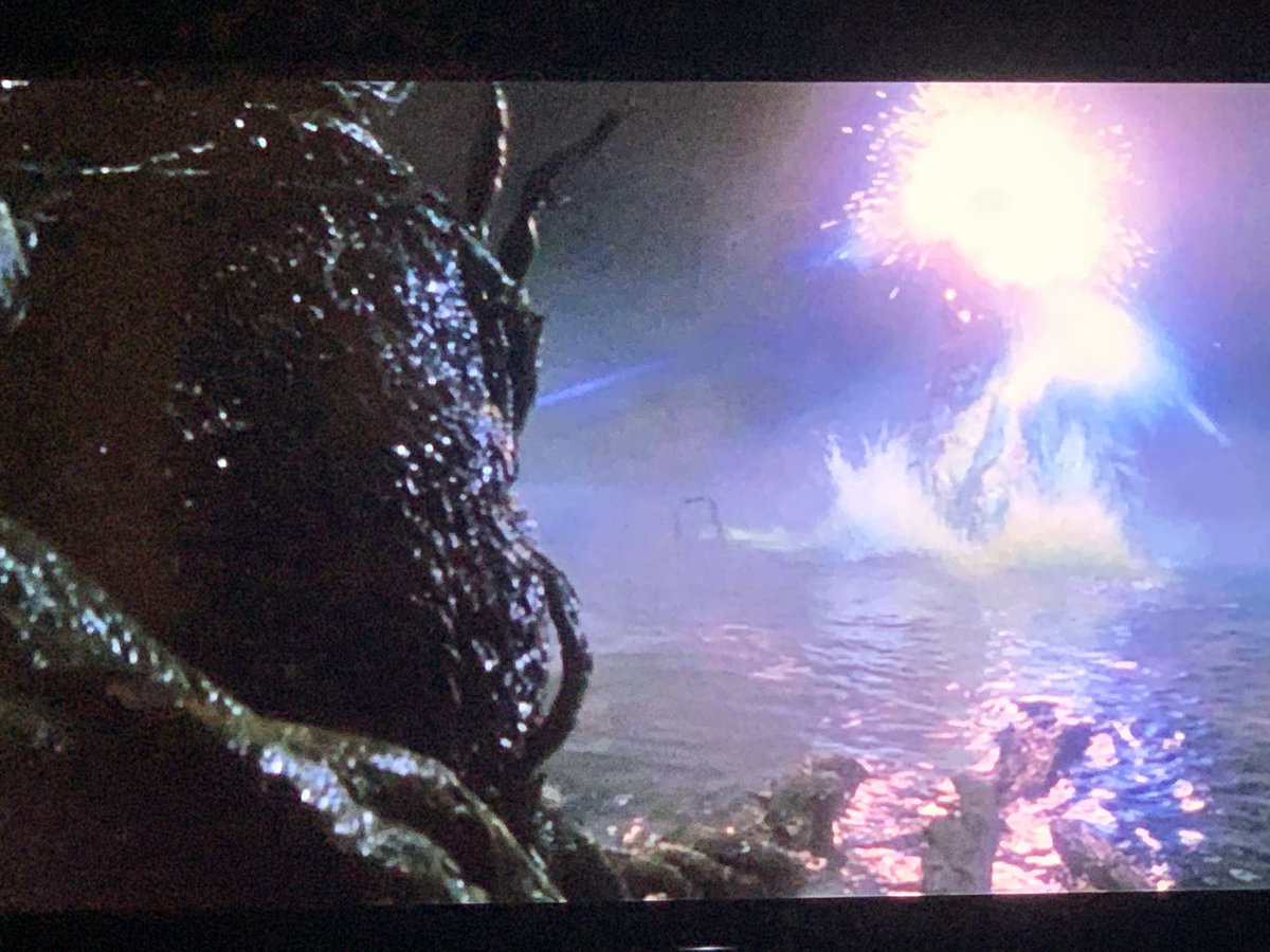 Godzilla battling Biollante.