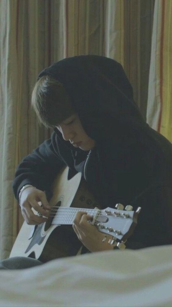 he plays guitar in front of u when u feel sad