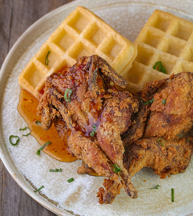 QUAIL AND WAFFLES WITH SPICY MAPLE SYRUP: An upland version of a fried chic...