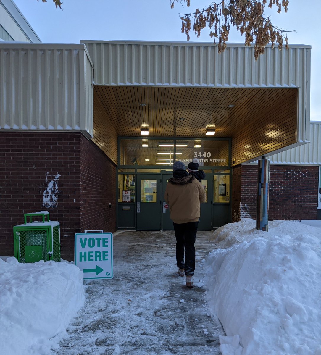 lexandraSK's tweet photo. We can see our polling station from our house, which is great because democracy doesn't get a snow day. #yxevotes #imwithcharlie https://t.co/SitisOx66r