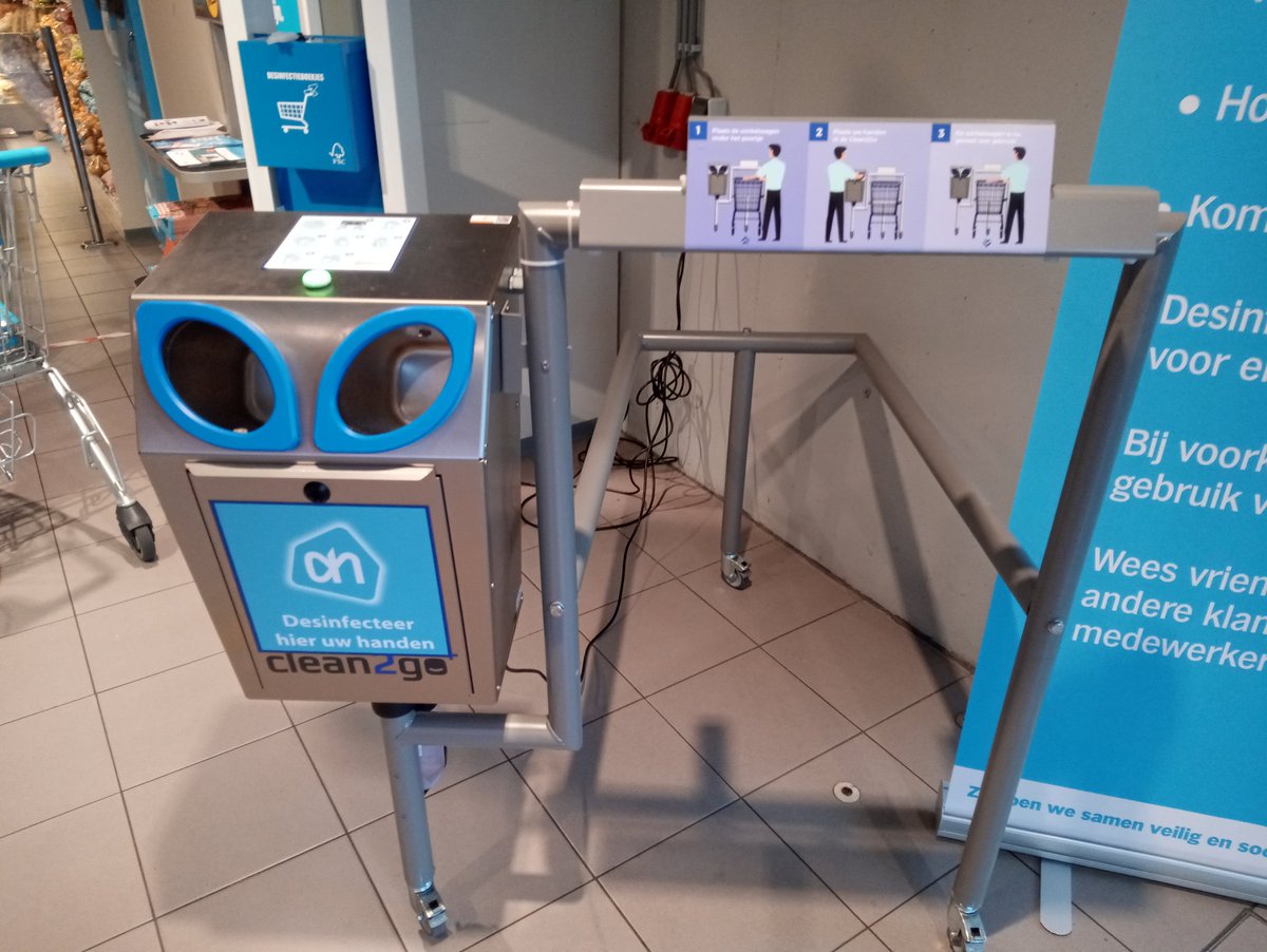 Albert Heijn - Uses a high-tech dispenser that utilizes lasers to spray hands and trolley within a specially designed docking station. It almost always misses resulting in highly sanitized sleeves and floor.
