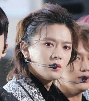 example one. my absolute favorite. nct yuta with his long hair is one of my favorite things in the world. sparks so much joy!