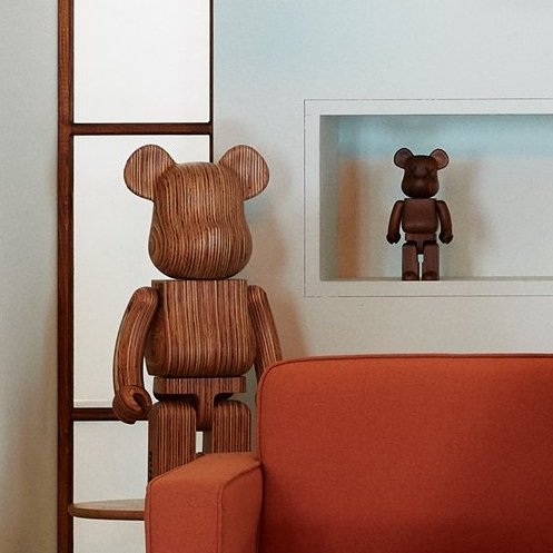 Namjoon chose his Be@rbricks to match the mid-century modern style, sticking with sleek figurines with a wooden finish, instead of anything else in the widely varied collection. The natural and organic figurines fit perfectly in the room. +