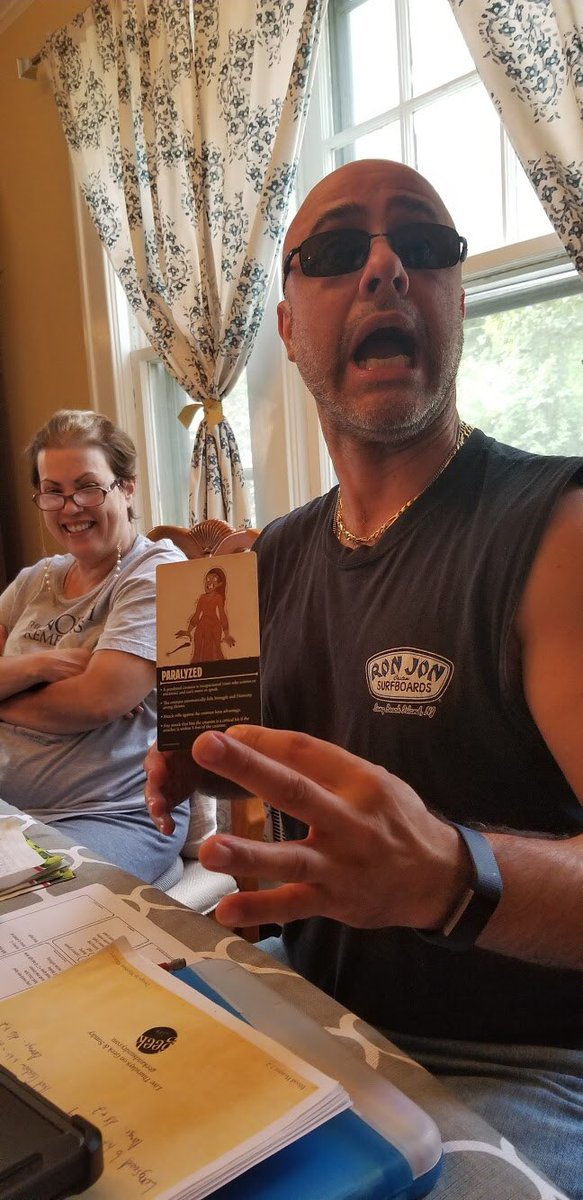 DndGrandma's tweet photo. Anthony demonstrates the “Petrified” condition as described by @TheDeckofMany.
Denise can’t even.
#gamingwithfamily #thefamilythatgamestogether #dndgrandma #dungeonsanddragons #dnd5e #ttrpg #deckofmany https://t.co/6OzmOsHBWb