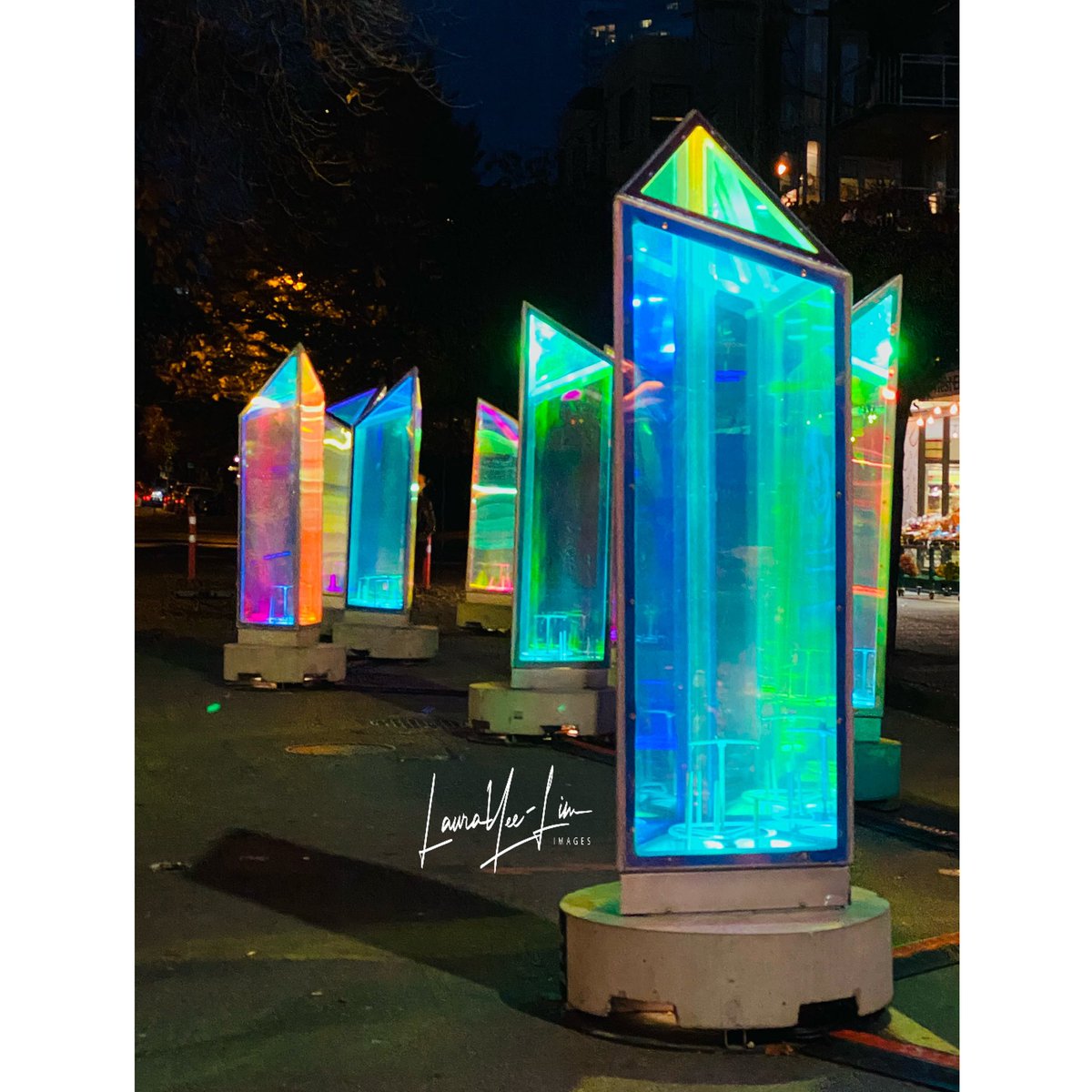 LoLoD_77's tweet photo. We missed @lumiereyvr last year so mum wanted to go before the rain starts this week. Beautiful night, beautiful installations. #vancity #vancouver #art #prisms #bells #jimdevaplaza #crane #tree #bear #englishbay #sunset #starrysky #lights #downtown https://t.co/KcUlMouqi4