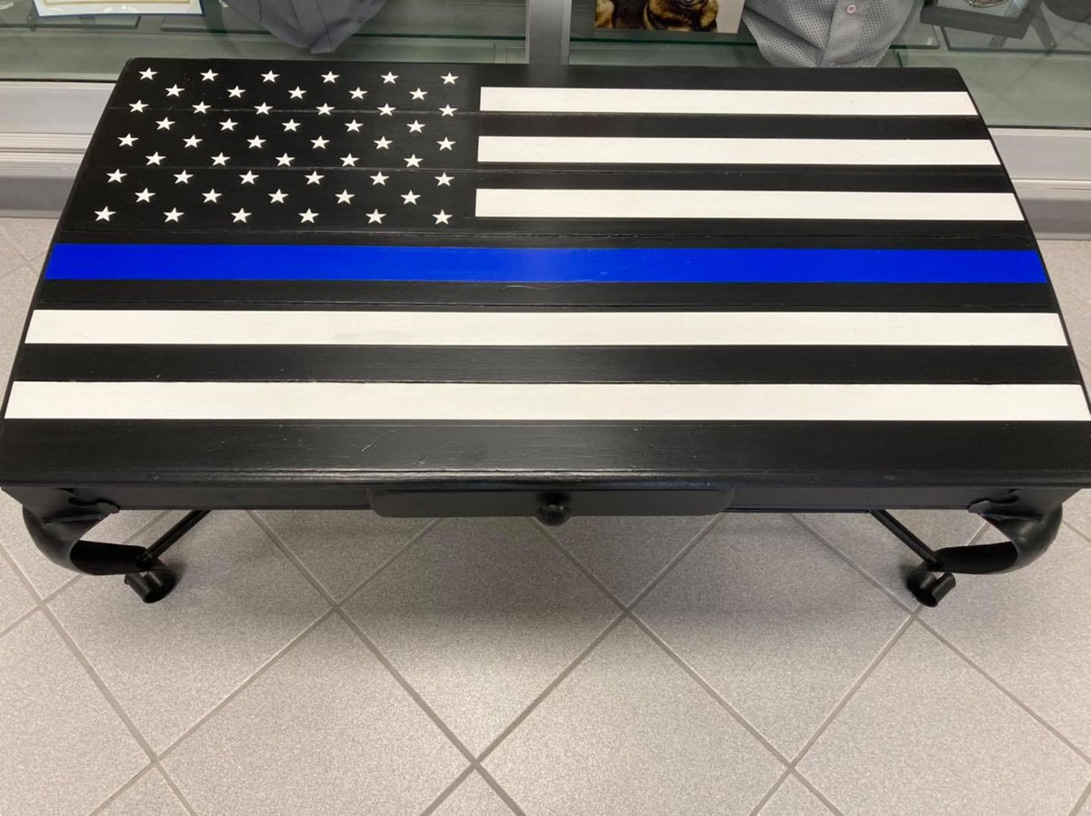 katyisdpolice's tweet photo. Thank you to Nottingham Country Elementary and Mandy Kleinman for donating the beautiful Thin Blue Line table in honor of the service of Officer James Grima. The table will be a permanent fixture in the lobby of the Law Enforcement Center. https://t.co/kevWSYiW6n