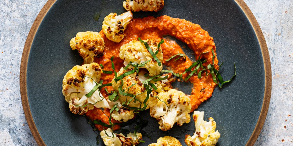 Vitamix's tweet photo. @NatGeoBooks gave a nod to Vitamix in its new cookbook, "What To Eat When," by @DrMikeRoizen and @DrCrupain, and we need to try EVERYTHING. One of our favorites: Roasted Cauliflower w/ Romesco Sauce

Copyright National Geographic 2020. All recipe images credited to Scott Suchman. https://t.co/TghpRoOeYN