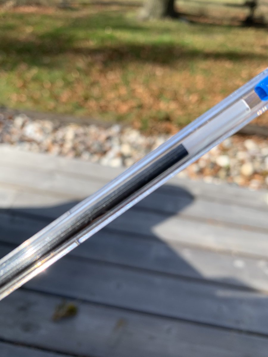 The pen's transparent polystyrene barrel and polypropylene tube show the ink-level. The ballpoint is first vitrified by heat, then ground down and milled to an accuracy of 0.1 μm (3.9×10−6 in) between spinning plates coated with industrial diamond abrasives.