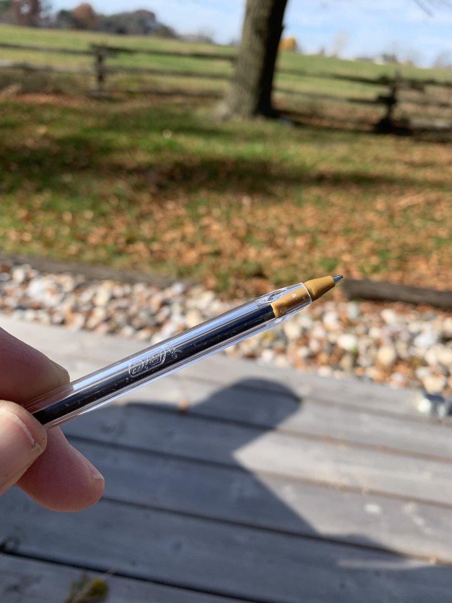 The pen's transparent polystyrene barrel and polypropylene tube show the ink-level. The ballpoint is first vitrified by heat, then ground down and milled to an accuracy of 0.1 μm (3.9×10−6 in) between spinning plates coated with industrial diamond abrasives.