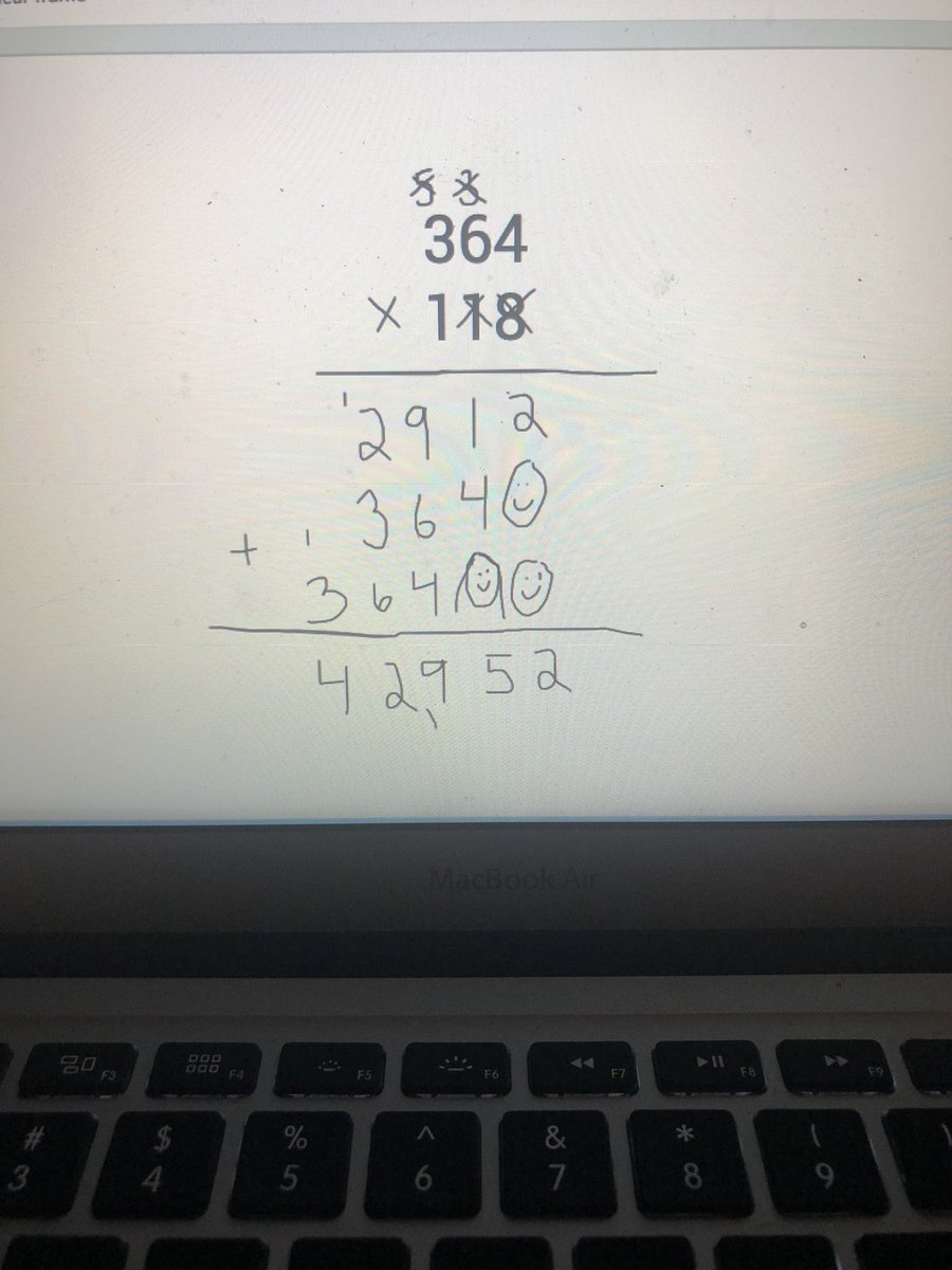 MissHTeaches3rd's tweet photo. When we finish the ones and move to the tens in standard algorithm we call our zero the “zero hero” so we never forget him! With 3x3 digit multiplication we have many zeros so my students decided that our zero hero has a wife and kids! Oh they make me laugh! #swd123 #d123 https://t.co/8u3yk2zuF4