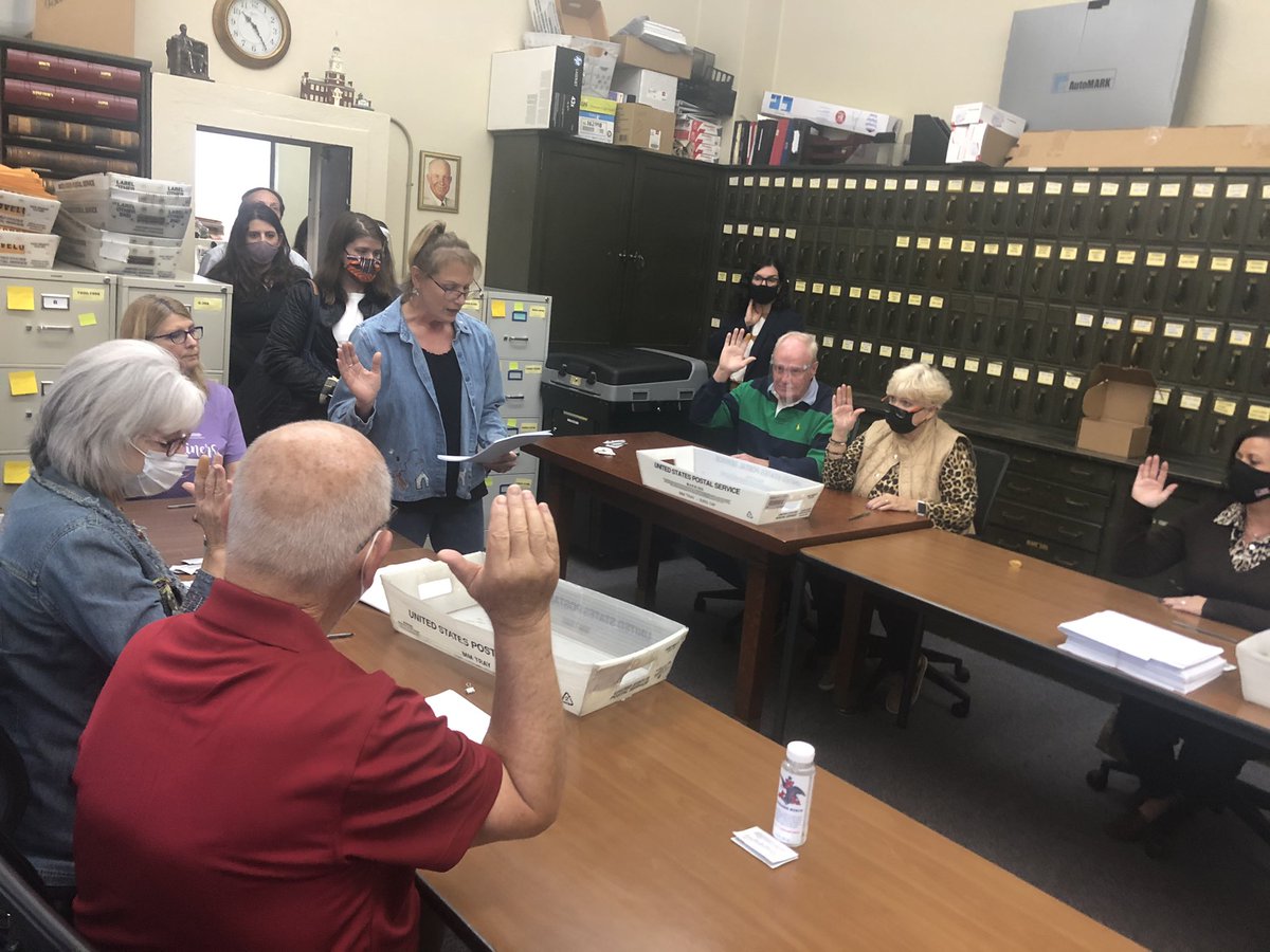 On Saturday there was a countywide machine recount of all votes. Today election workers are doing a hand audit of the precinct where the error occurred, Clear Creek Poweshiek. Here they are taking an oath before beginning.  #IA02  #iapolitics