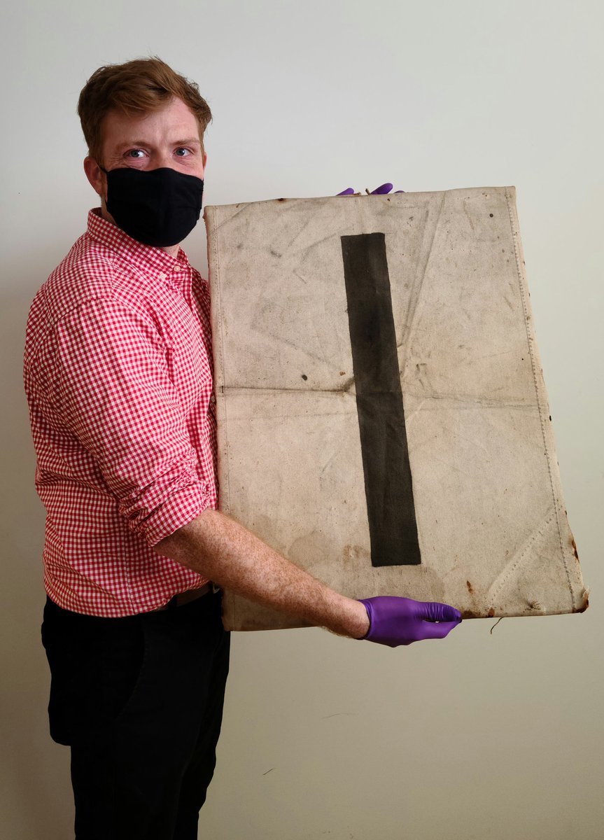 Anticipating the 100th anniversary of Bluenose next year and assessing our collection of Bluenose artifacts. 
Our Curator,  Adrian Morrison,  is holding the number 1 which was removed from Bluenose after her final race in 1938, against Gertrude L. Thebaud, in Gloucester, MA.