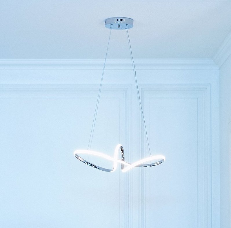 My favorite part of the room (apart from the chrome paint in the couch that reminds me of his painting!) is this amazing hanging lamp. Yoongi chose this infinite loop lamp as a wonderful example of the abstract minimalism blended into the traditional decor. +