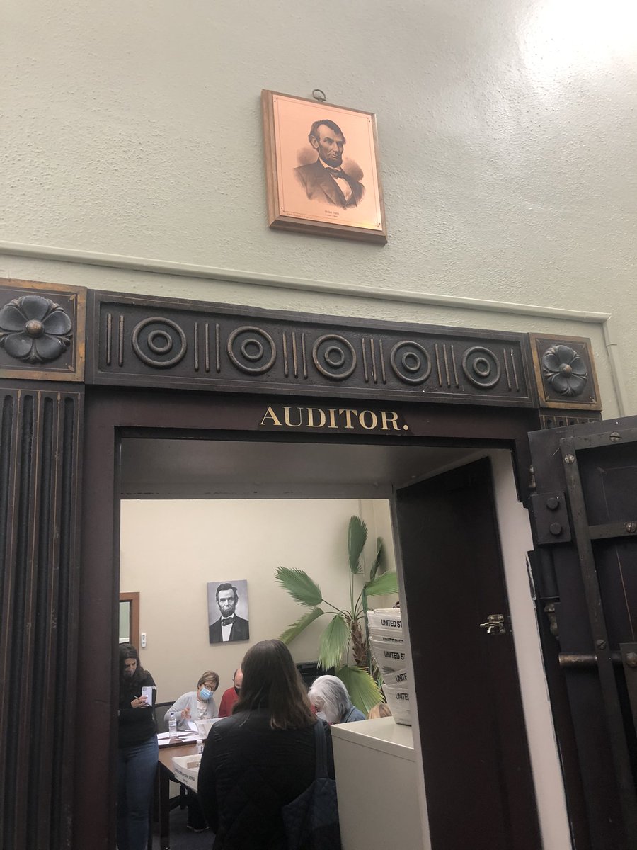 The process is happening inside what is apparently an old vault here at the Jasper County Courthouse. Lots of presidents watching from the walls (there is a serious penchant for presidential memorabilia here).  #IA02  #iapolitics