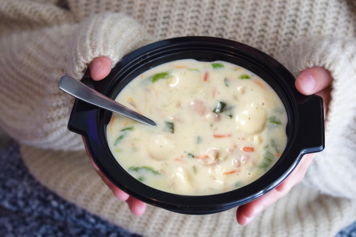 olivegarden's tweet photo. Self-care is eating Chicken &amp; Gnocchi soup in a chunky sweater. 🤗 https://t.co/Biec6pm7T2