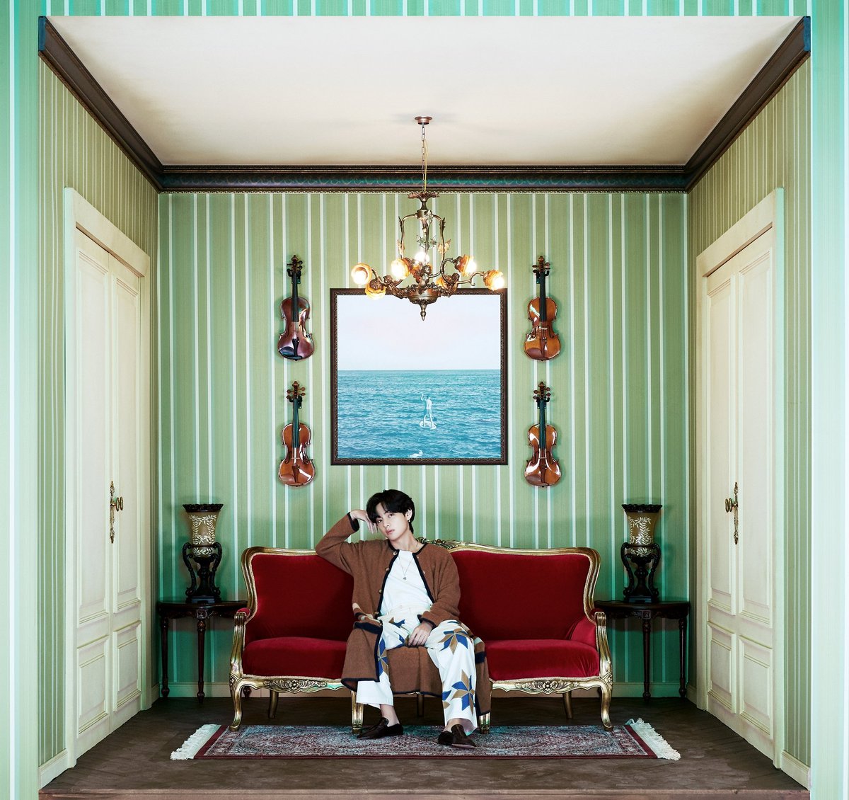 Taehyung's room is similar in style to Jimin's, but it's even more stripped down European decor. I'd probably put it as 'shabby chic' interior design, with its vintage French feel. The luxurious couch (and Tae) stands out amidst rustic vintage decor. + #V  @BTS_twt