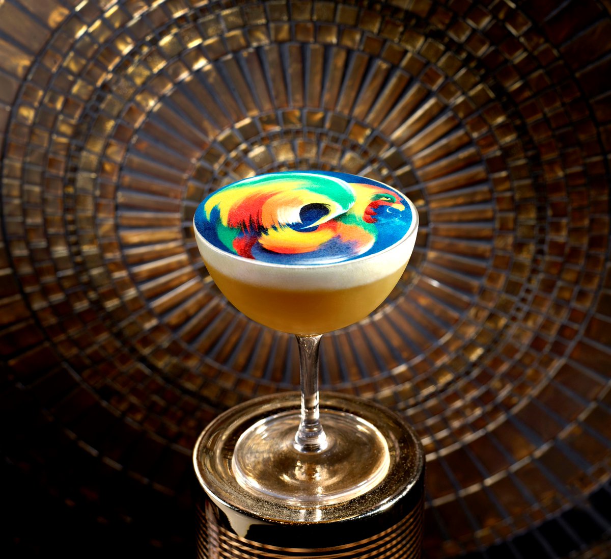 MO_SINGAPORE's tweet photo. Taking centre stage in MO BAR’s new volume three menu is Sarimanok, a rum and mango based cocktail inspired by the majestic rooster of Maranoas, whose bold wings and feathered tail are captured magnificently with our edible rice paper garnish. #MOBARSG #MOdrinks https://t.co/D8W3Nbnb63