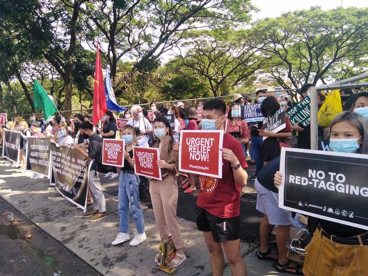 inquirerdotnet's tweet photo. LOOK: Students from various universities gather at Ateneo to protest against "President Rodrigo Duterte's negligence in past disasters." | 📷Philippine Collegian https://t.co/orJ3tl7pvO