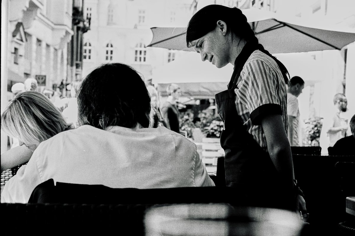 Taking an order restaurant in Lviv Ukraine, ILORD HP5 Plus & Leica M7 | APO 75mm Summicron lens. 

#Ilford @ILFORDPhoto #35mm #AnalogPhotography #film #FilmPhotography #LeicaFotografieInternational #LeicaCamera #Leica  #TheLeicaLook #LeicaWorld #LeicaSociety