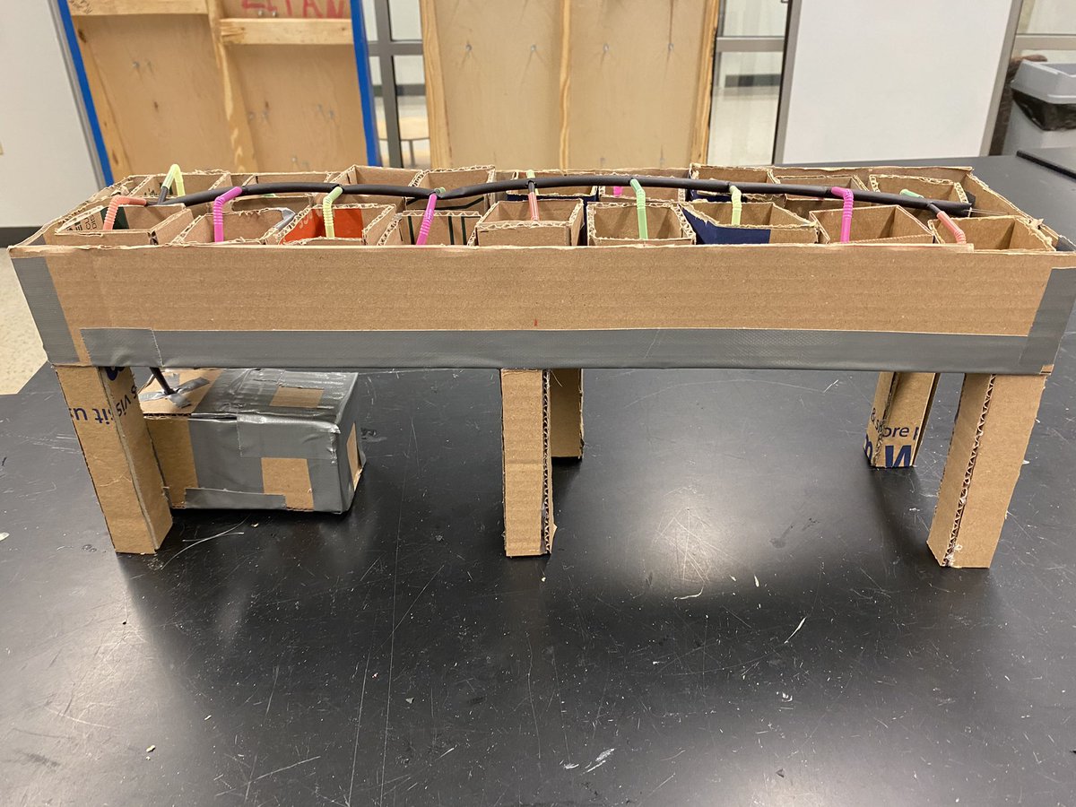 EpicsHaiti's tweet photo. Team Hydroponics finished their cardboard prototype of the drip system based on their conceptual design!  This system will be used by the students at the Le Refuge School in Haiti to grow plants like tomatoes and beans. https://t.co/brTeS5K8uc