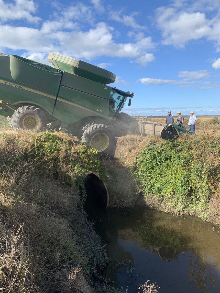 My cousin’s combine today , tile caved in crossing a canal #harvest20