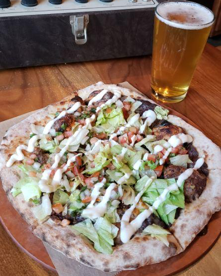 pieandcone's tweet photo. What do you get when you cross #MeatlessMonday with #TacoTuesday? The Taco Salad pizza, of course! It's a meal the whole family can agree on. Try a pie on our patio, or get yours to go by calling us at 323-274-4728. https://t.co/P7xHqJi5An