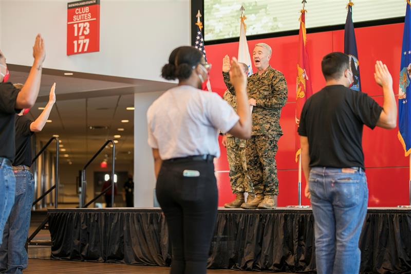 CENTCOM's tweet image. Gen. Frank McKenzie, #CENTCOMCDR administered the oath of enlistment to 30 multi-service enlistees at Raymond James Stadium on Nov. 4th. The event was recorded and played on the big screen during the #TampaBayBucs game last night.