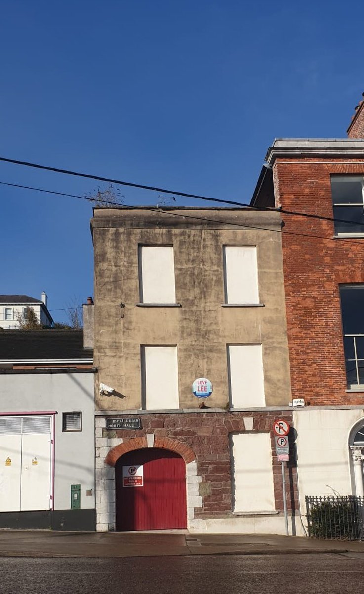 what was once a character property along Cork city historic waterways is a weird facade, albeit with  @savecorkcity plaqueokay we didn't demolish entire building but how does this contribute to street, image RHS 2009  @googlemapsNo.158  #regeneration  #heritage  #respect  #liveable