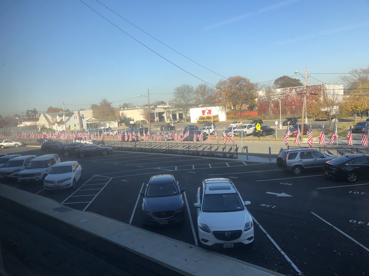 fsclafani91's tweet photo. A preliminary look at our Flag Field of Honor.  150 flags!! The students raised $1500 for America’s VetDogs- I am so proud of them!! Stayed tuned for more pics from our planned ceremony on Thursday Nov 12 at 1145.  #mineolaproud https://t.co/wmIj9daRVv