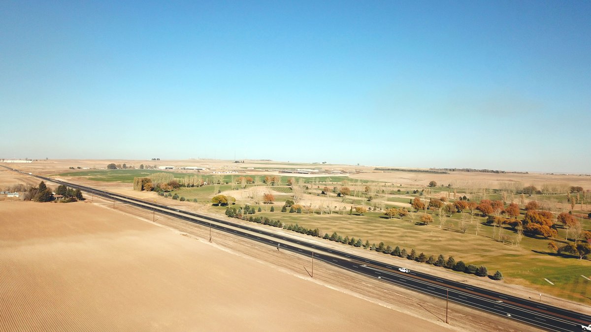 IdahoITD's tweet photo. This aerial image showcases not only the fantastic fall foliage of southern Idaho, but also the newly widened portion of US-93 completed this year. #Idaho #infrastructure #drivewell #Idahome https://t.co/LlOyg37QNh